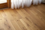 Koberce a dřevěné podlahy - jak na ně?